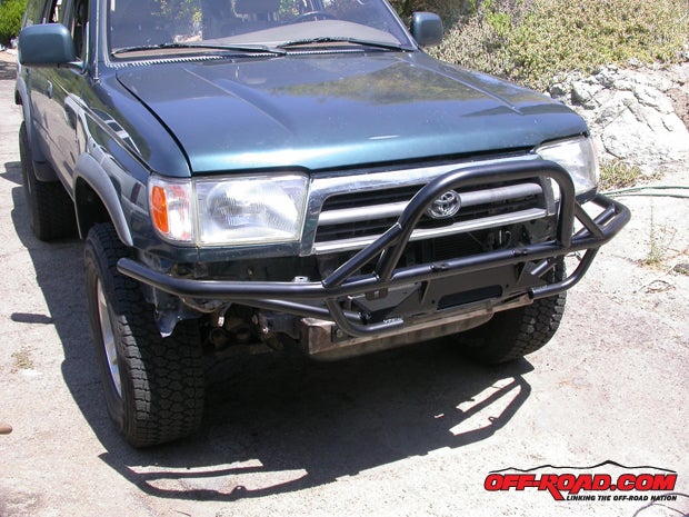 With the sub-bumper fitted, carefully attach the main bumper and check it for alignment with the bodywork and grille, then tack-weld the sub-bumper in place.