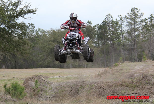 None of the jumps on our test track were big enough to try any tricks, but I wasted no time getting the quad in the air with our "revived" TRX 450R.