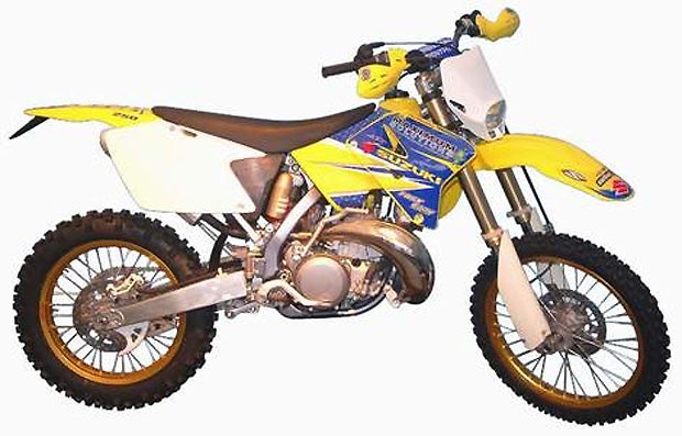 An older 2-stroke motocrosser can make a great trail bike. Just look at the limited edition Paul Edmondson, four-time enduro World Champion put together. This mean Suzuki RM250 enduro proved to be a weapon on the trail and a boat load of fun! (Photo Suzuki Motor Corp.)