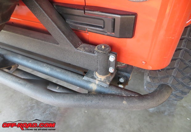 Pivoting on a large stud with grease-able roller bearings, the tire carrier can officially carry up to 35-inch tires, but Im sure 37-inch tires would easily fit. The carrier can also be adjusted for different wheel off-set depths.