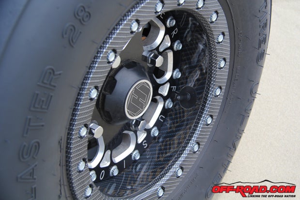 No thats not an optical illusion: Proline Wraps incorporated the Muzzy's Performance logo in the wrap covering the inside of the wheel.