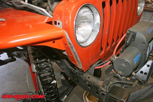 The TNT higher fenders mount directly back into the OEM holes; however, some bracketssuch as the windshield washers mountand accessories may have to be relocated or replaced.