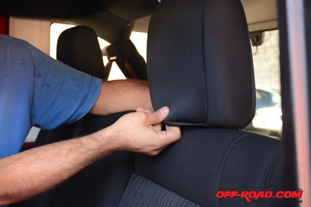 The rear headrests on Jeep Wrangler Unlimited models don't detach, so the CalTrend headcovers simply slip over them.