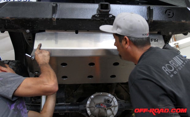 The Asfir 4x4 TJ Gas Tank Skid Plate is designed to fit over the stock gas tank shield, which we like because it does not rest directly on the gas tank and offers an extra level of protection. It is designed thoughtfully to use the preexisting bolts and it cut to fit over the stock hardware. 
