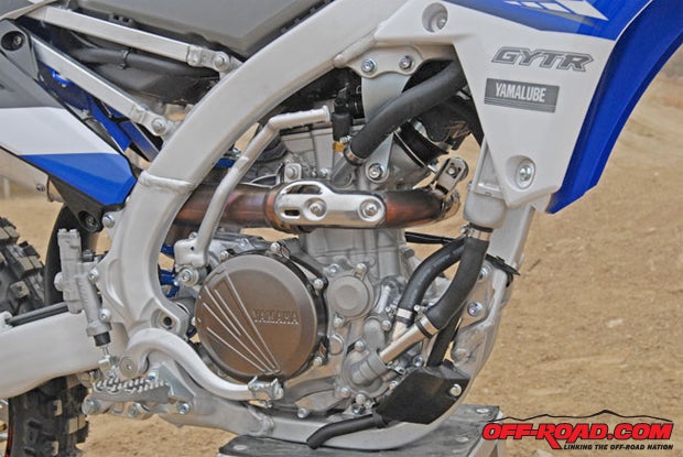 Very little was done for 2015 to the YZ250F's engine. The new Yamaha does have a few minor tweaks, though, such as a revised exhaust cam to make it easier to start, updated ECU settings for smoother low-end response, a new piston for better oil control and new coatings to improve the durability of its titanium exhaust valves.