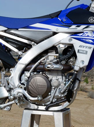 The YZ450Fs fuel-injected DOHC Single was already a beast. Yamaha fine-tuned the ECU and ignition curves to make it more controllable without sacrificing its exhilarating power character. Mission accomplished.