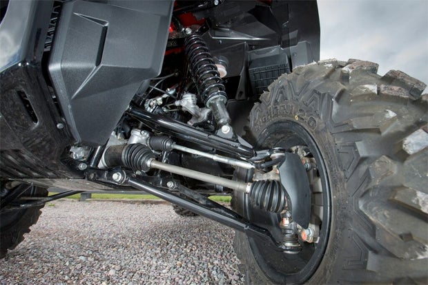 The dual A-arm front suspension provides 10.5 inches of travel, and the Pioneer 1000 offers up to 12.9 inches of ground clearance.