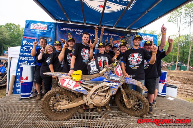 Jeremy Martin celebrates his 2014 championship with his team