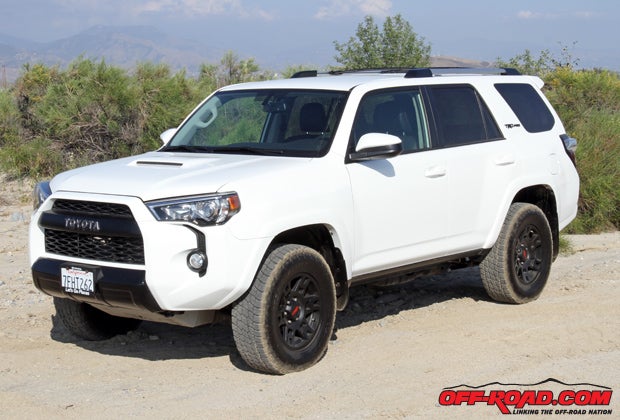 The 4Runner TRD Pro offers unique styling, including a Black TOYOTA grille, black bezel headlights, black badging and more.